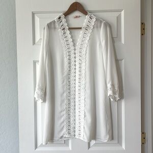 White swimming suit coverup